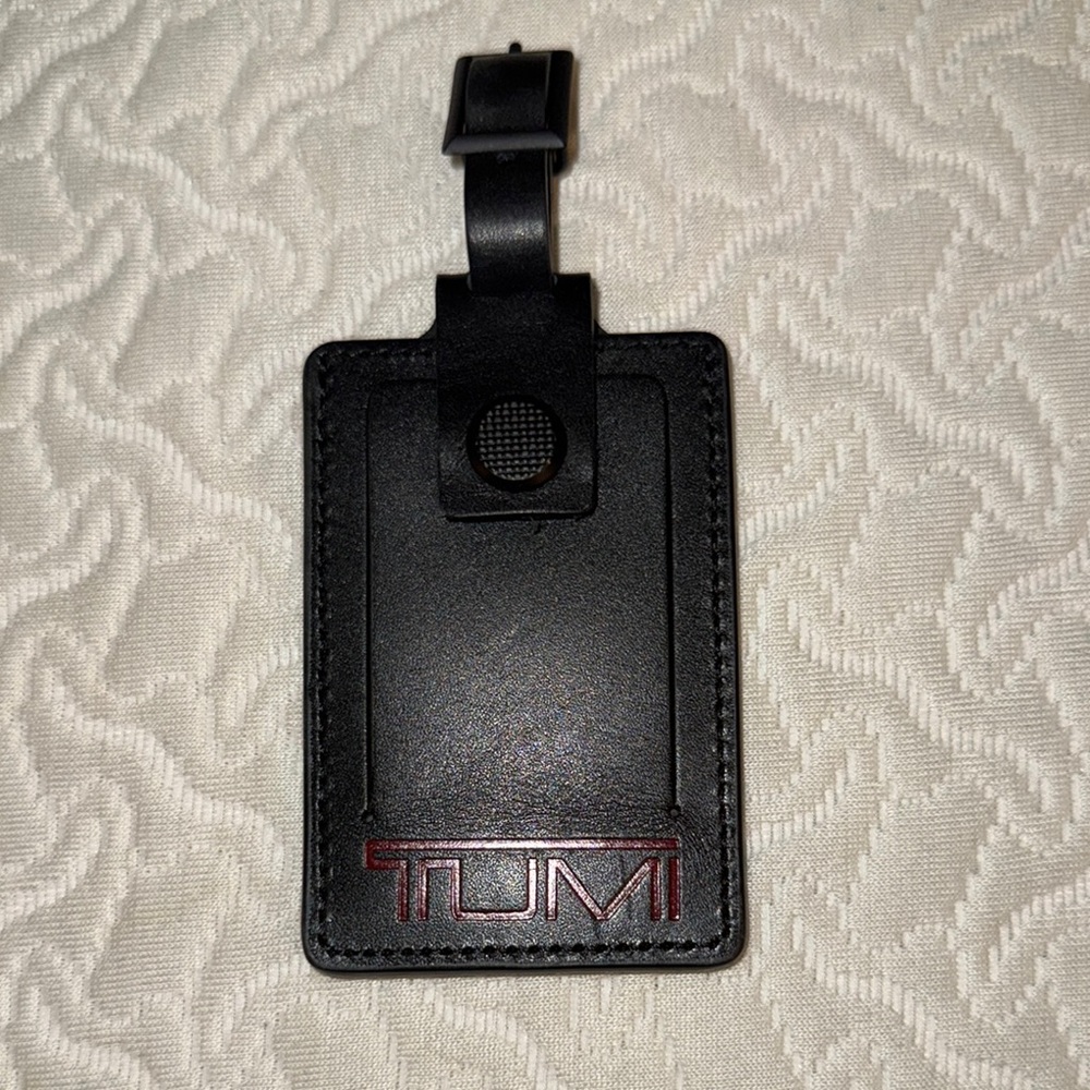 Tumi Black and Red Luggage Tag